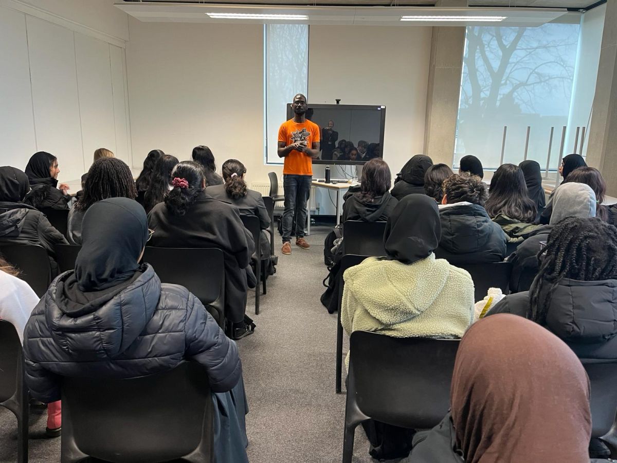 Nigel Twumasi speaking at a school or educational event